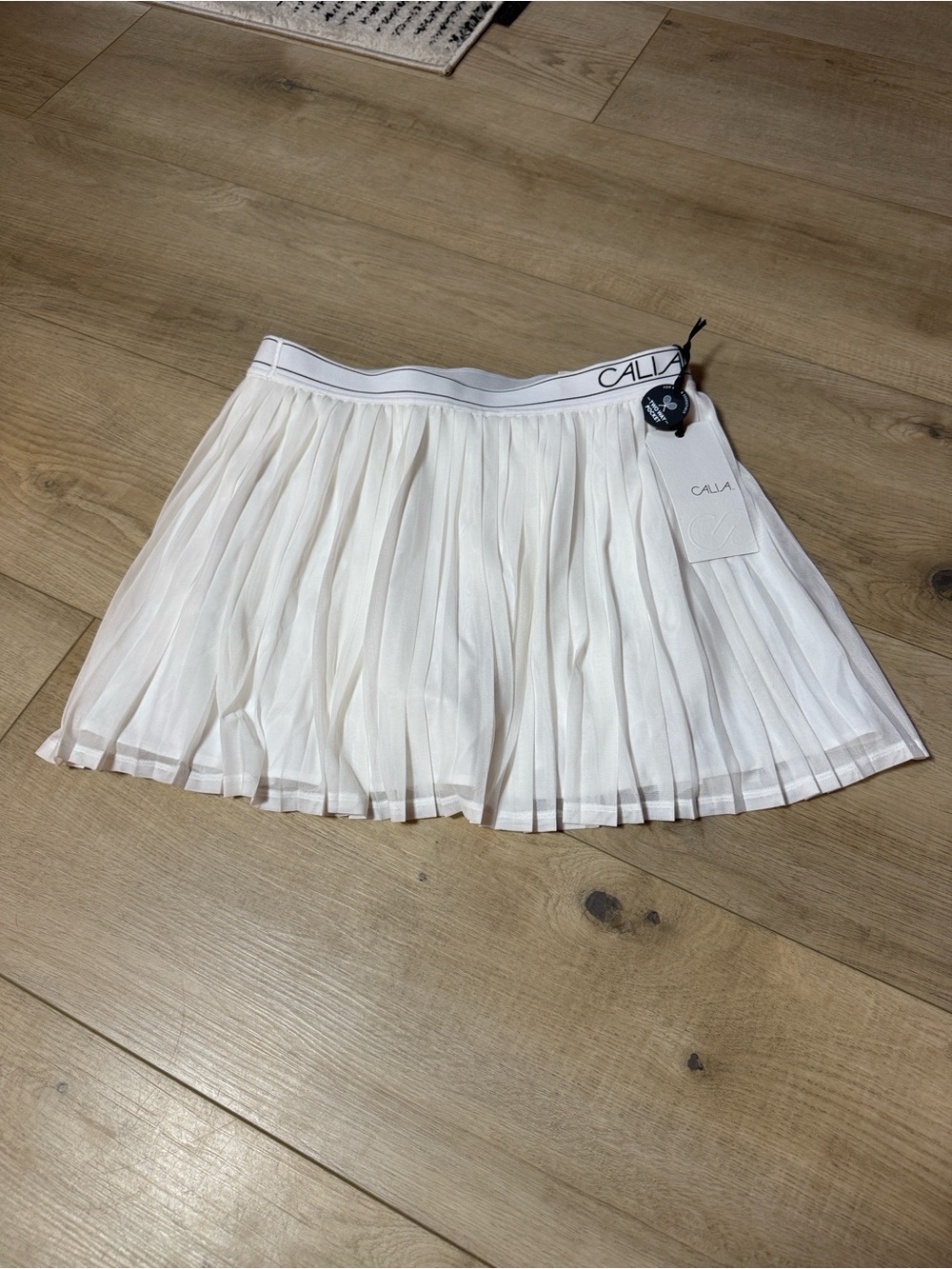 CALIA by Carrie Underwood White Pleated Mini Skirt